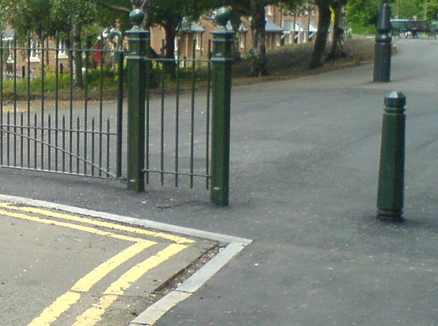 A Cyclist passing the gate